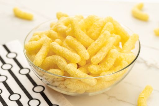 A Close up of a Corn sticks in bowl on table still life
