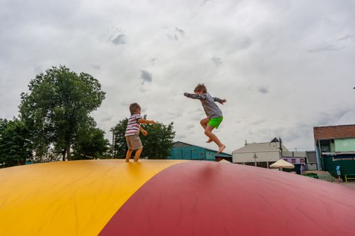 The male kids on a colorful jump pillow in the Nenufar Club leisure park in Koscian, Poland
