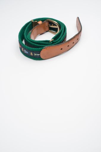 A vertical shot of a fashionable belt isolated on white