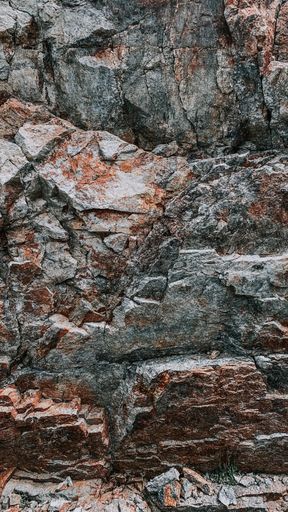 A vertical shot of a rock texture background
