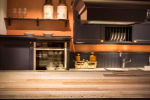 Wooden table and modern kitchen background ready for product or food display or montag