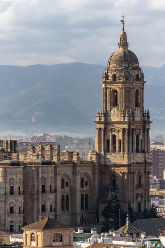 A vertical shot of the Holy Cathedral of the Incarnation in Malaga, Spain