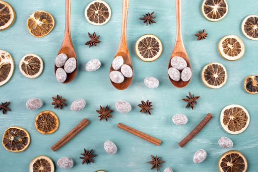 A closeup of spiced almonds with chocolate powder, traditional german Christmas sweets.