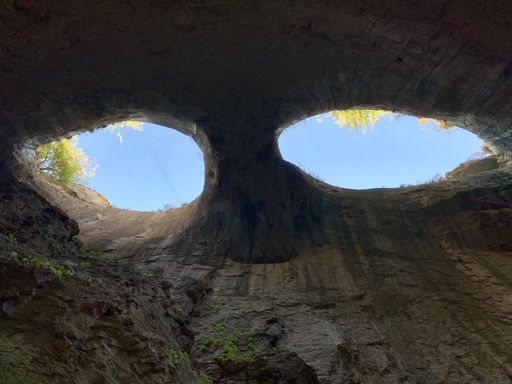 An upshot from a cave of two cave holes in a shape of eyes