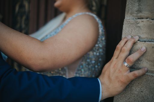 A marrying couple hugging each other during the wedding