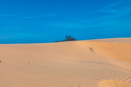 The beautiful sand dunes of Mui Ne, Vientam under a clear blue sky