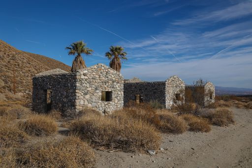 The preserved ruins of three stone cabins sit in an environmental preserve outside of Palm Springs where visitors can explore the structures.