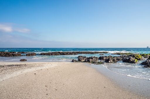 A beautiful shot of a calm sea under the blue sky