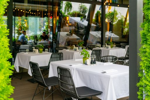 A beautiful view of an exterior of a summer street cafe in Moscow, Russia