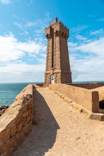 A vertical shot of a Mean Ruz Lighthouse in Perros-Guirec in Britany, Northwest France