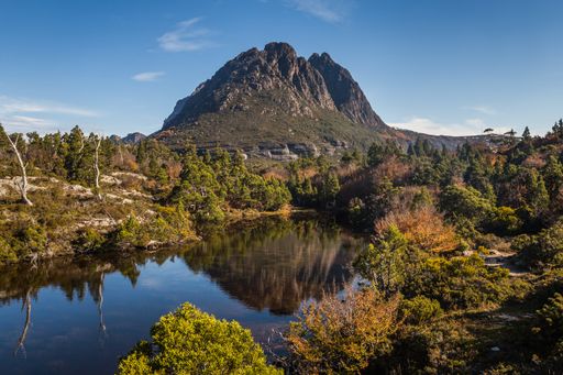 A beautiful view of Little Horn peak reflected in the Twisted Lake in Tasmania, Australia