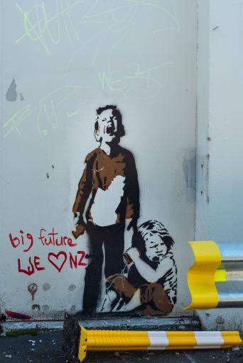 Vibrant graffiti of children on a wall in Tauranga, New Zealand