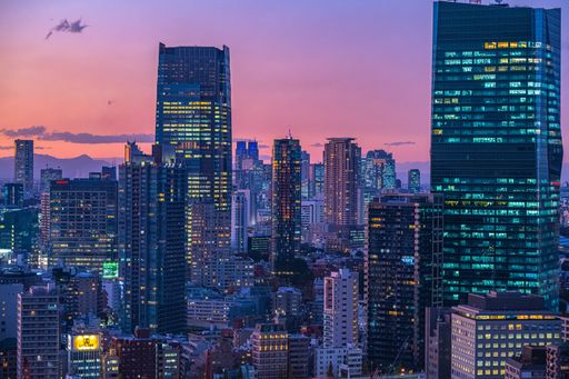 An aerial shot of the Tokyo cityscape at night