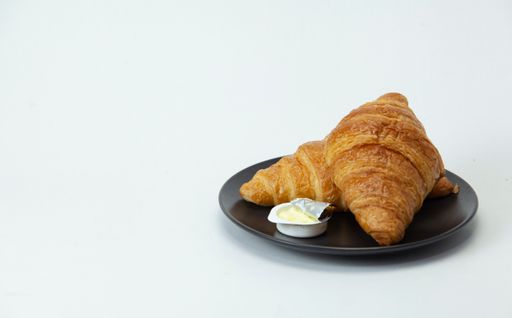 Delicious croissants on Plate isolated white background