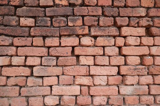 A closeup of old weathered brick wall texture