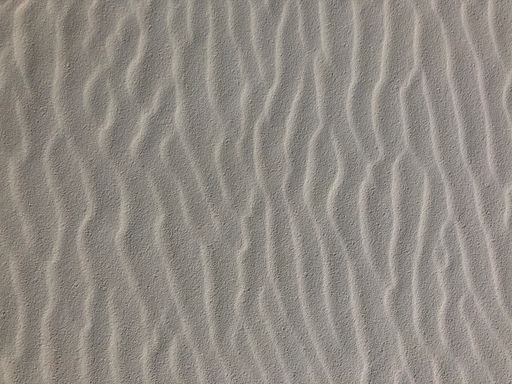A closeup shot of the wind-swept sand in the desert in New Mexico - perfect for background