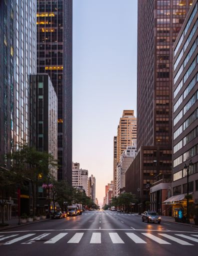 A vertical shot of New York City street in the morning