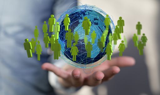 A 3d rendering of human figures around the globe hovering over man's palm - communication and human capital concept
