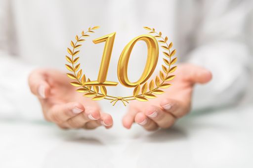 A digital 10 years anniversary award in a hand