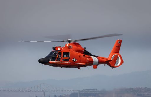 US Coast Guard helicopter flies over Alcatraz Island in San Francisco