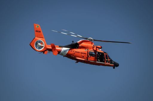 US Coast Guard helicopter flies over Alcatraz Island in San Francisco