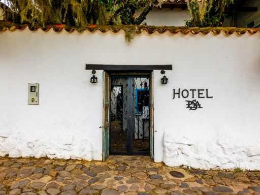 A close-up shot of the facade and old door of one of the old houses in the colonial town of Villa de Leyva