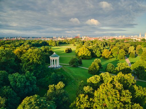 Monopteros in English Garden. Replica Greek temple with garden views build in 19th century in Munich central Park. Aerial drone shot during summer