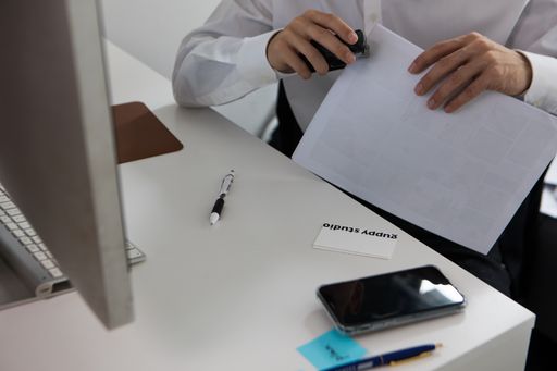 A closeup shot of an East Asian businessman captured while working in his office in South Korea