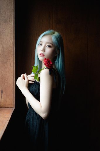 A beautiful blue-haired South Korean female with a single red rose