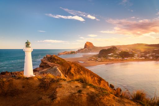 A beautiful shot of a Castlepoint lighthouse in Wairarapa, New Zealand during the sunse