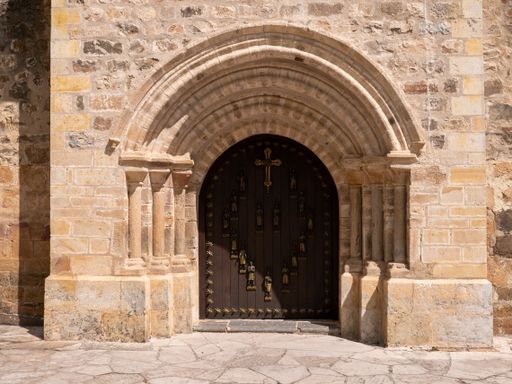A closeup shot of a monastery entrance door of Santo Toribio de Liebana in Spain