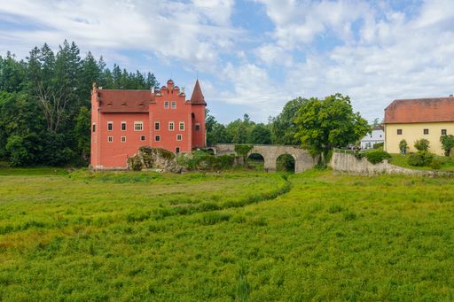 A popular tourist destination water castle red Lhota currently with a drained pond