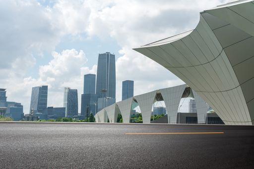 Empty street in downtown of a modern city with office buildings