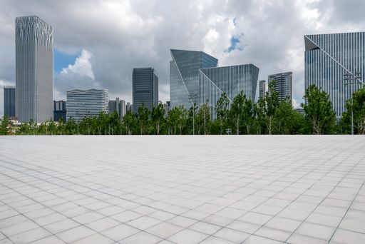 Empty street in downtown of a modern city with office buildings