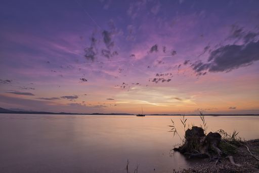 A landscape of the sea with long exposure during a beautiful purple sky