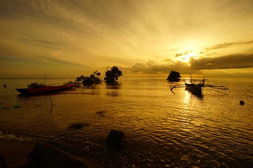 A stunning view of the bright sunset over the sea