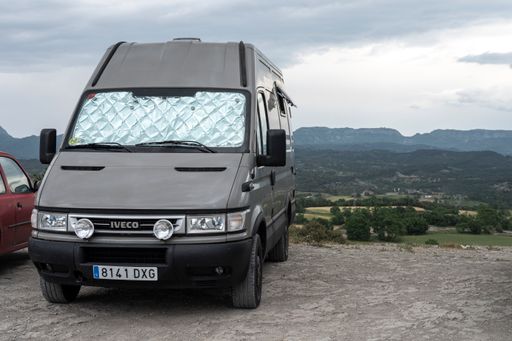 Modern gray van converted into a campervan.