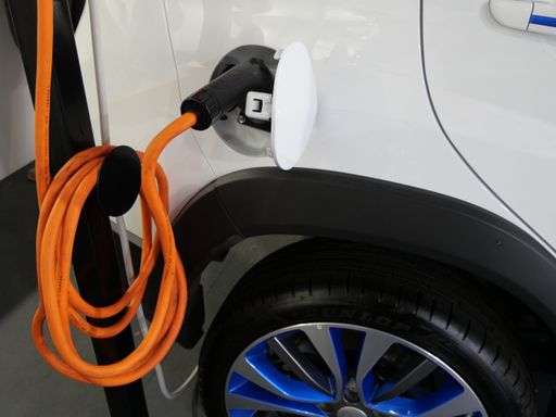 A closeup of an electric car plug-in socket. Turin, Italy.