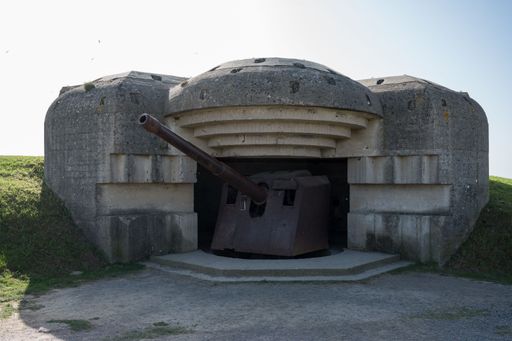 German bunker of Longues-sur-Mer battery Batterie de Longues-sur-Mer with a rusty cannon pointing