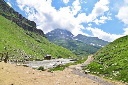 A beautiful shot of mountains covered in green during the daytime