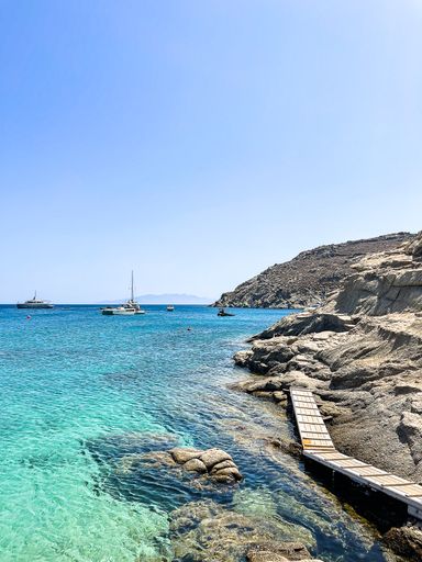 A vertical shot of fishing boats on a sea