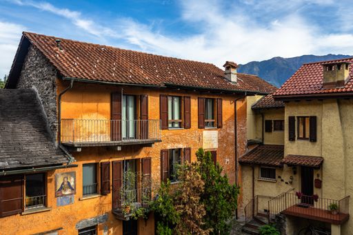 A shot of cityscape of Locarno with typical colorful houses, a pretty town on the shores of Lake Maggiore, Canton Ticino, Switzerland
