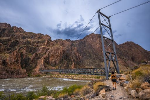 A beautiful shot of the Colorado River in the Grand Canyon under a blue sky