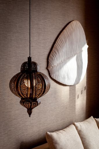 A vertical shot of the interior with chandelier at hotel Abama