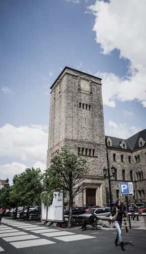 The high clock tower of the imperial castle building in Poznan, Poland