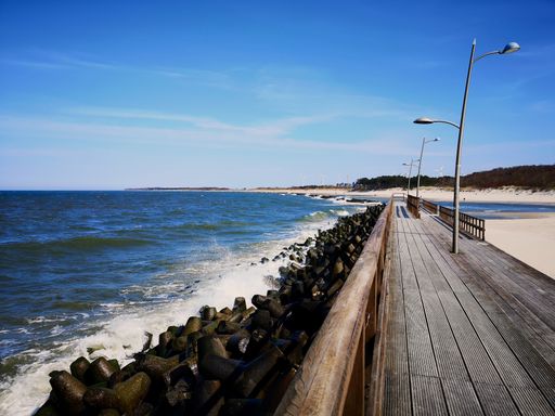 A beautiful shot of Nobbys Beach pier on a sunny day in Newcastle, Australia