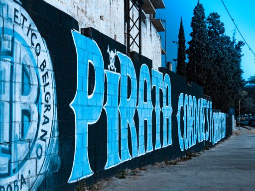A graffiti text and sing on the wall at dusk in Cordoba, Argentina