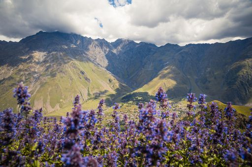 The view from Gergeti Trinity Church (Tsminda Sameba) in Kazbegi, Georgia in summer