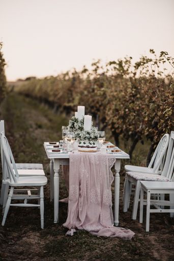 A vertical shot of the wedding table with beautiful decorations.