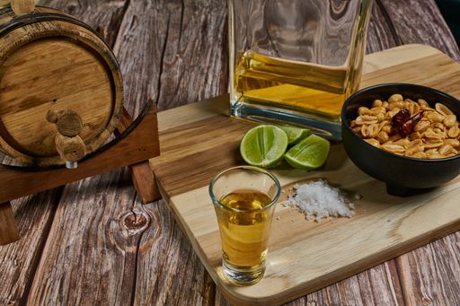 How to take a shot of tequila in Mexico with its lemon and salt and chili peanuts